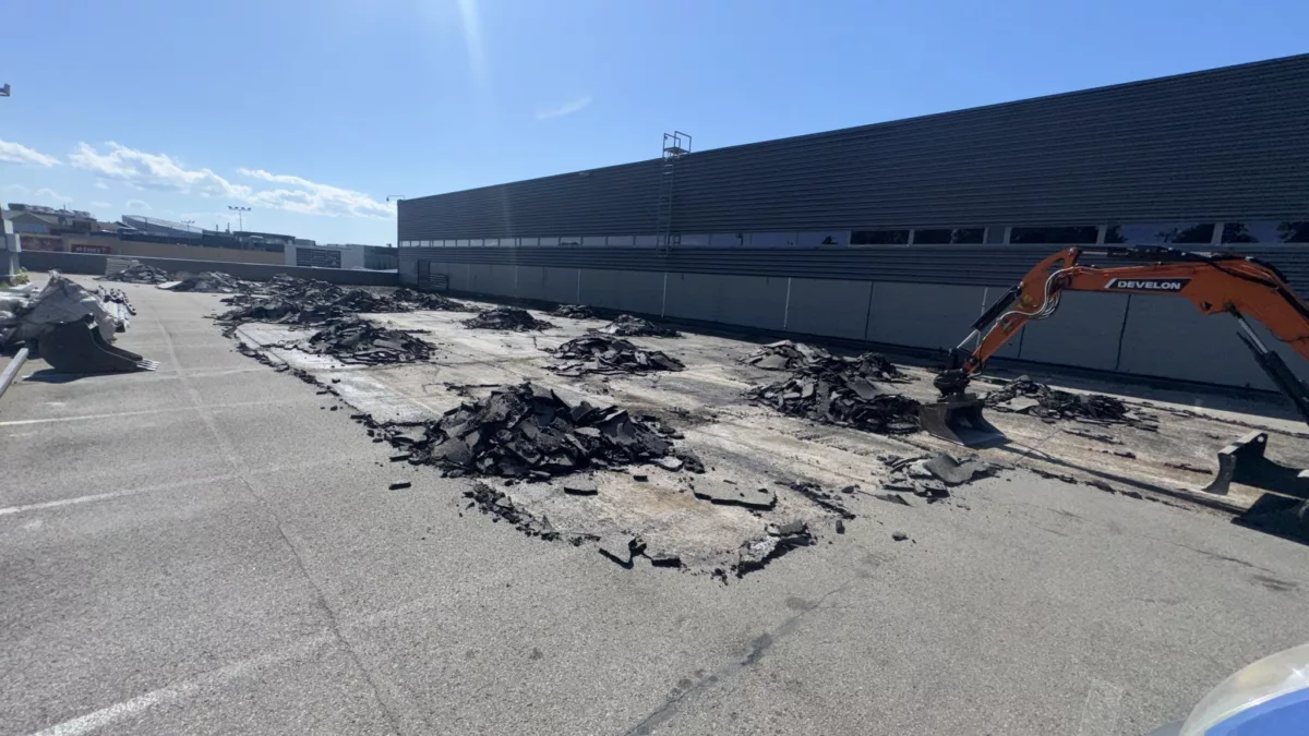 Stāvvietas seguma konstrukcijas nomaiņa