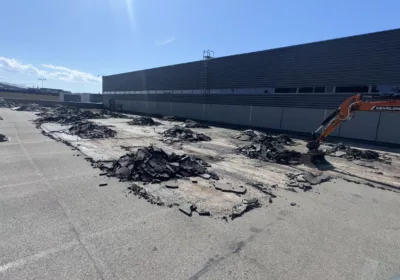 Stāvvietas seguma konstrukcijas nomaiņa