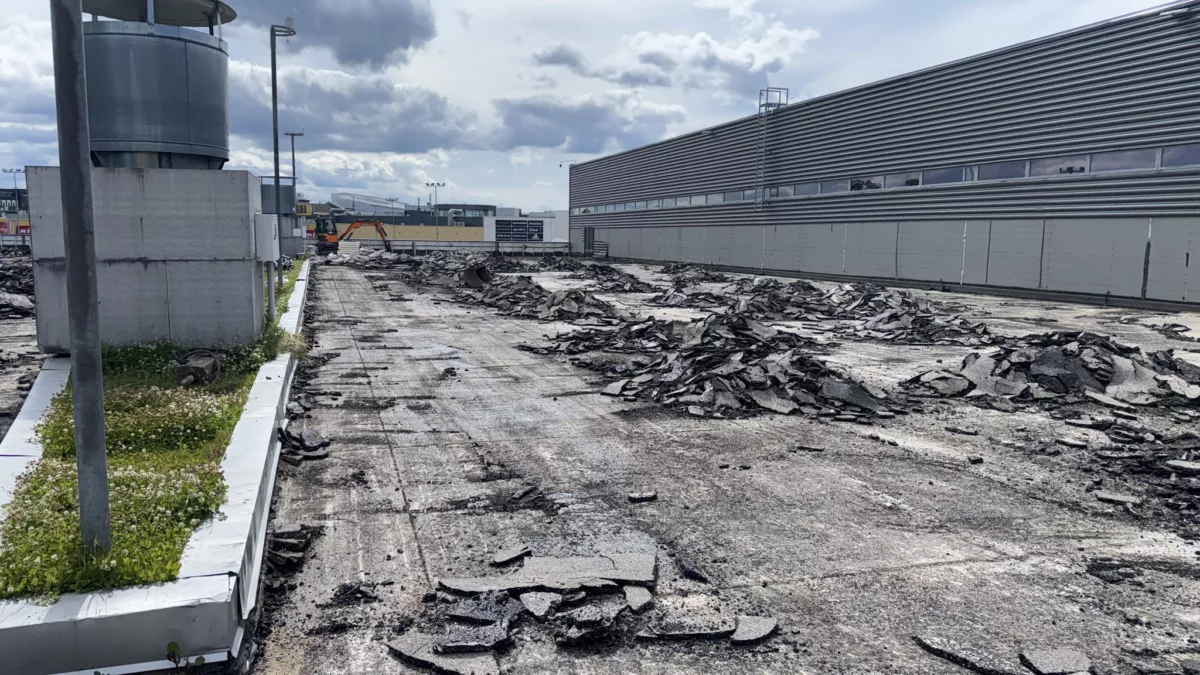 Stāvvietas seguma konstrukcijas nomaiņa