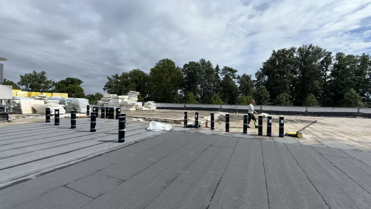 Stāvvietas seguma konstrukcijas nomaiņa